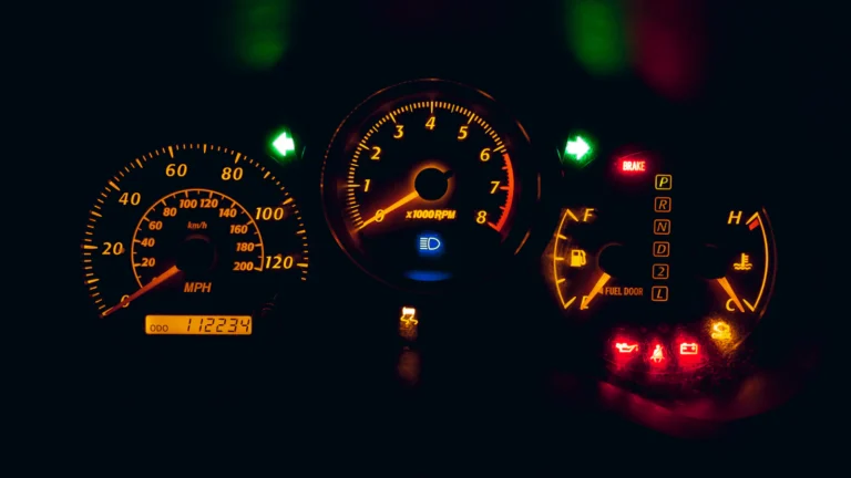 Illuminated car instrument cluster with warning lights